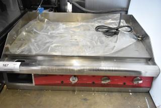 Brand new Avantco 177EG30N 30" stainless steel electric countertop griddle with thermostatic controls, 208/240V, 1 phase.