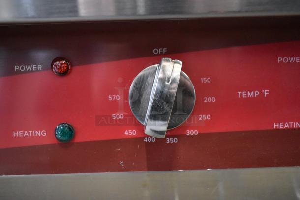 Stainless steel control panel of Avantco 177EG30N griddle, showing temperature dial and power indicators. New condition.