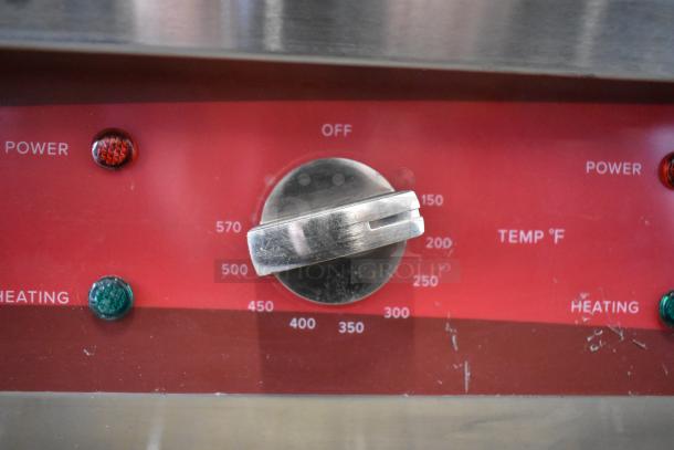 Avantco 177EG30N stainless steel 30" electric griddle, close-up of thermostatic controls with temperature markings.