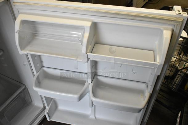 Maytag M1TXEGMYW01 cooler freezer interior door with shelves, model label visible. Good condition, single door, 115V, 1 phase.