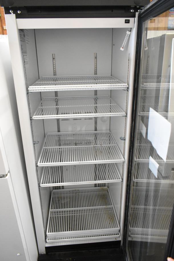 2019 Habco SE18 metal single door reach-in cooler, poly coated racks, 115V, 1 Phase, excellent condition.