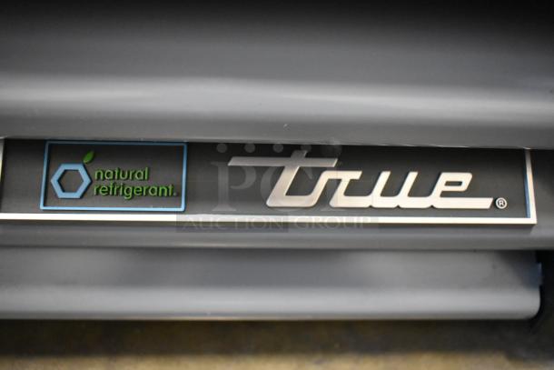 True GDM-12-HC cooler label with "natural refrigerant" marking, showcasing eco-friendly feature.