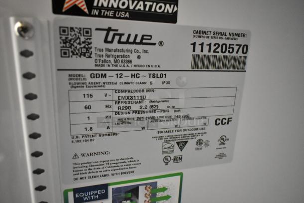 2025 True GDM-12-HC single door cooler label, 115V, model GDM-12-HC, features R290 refrigerant, metal frame, poly coated racks.