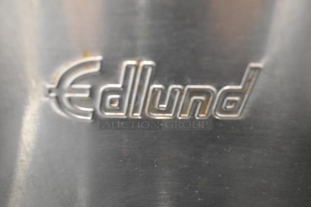 Edlund stainless steel commercial countertop unit with embossed brand logo, showcasing durable construction.