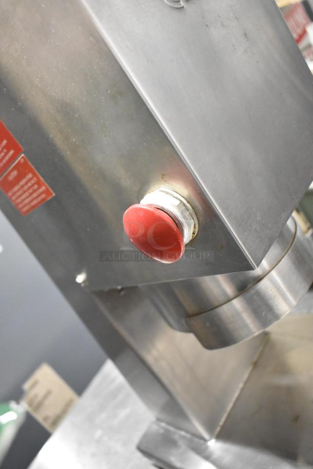 Edlund stainless steel commercial countertop unit, featuring a red button, in good condition.