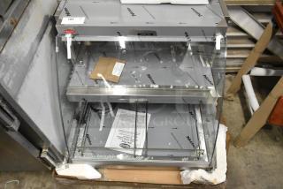BRAND NEW Hatco GRCD-2PD heated display case, metal, 120V, 1 Phase, scratched; protective wrap and documents visible.