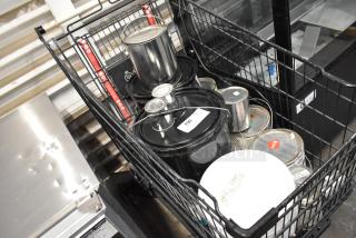 Various buckets of Proflex Primer Part A and Clear Blue 1524 Epoxy in a cart, condition unknown. Labels show item details.