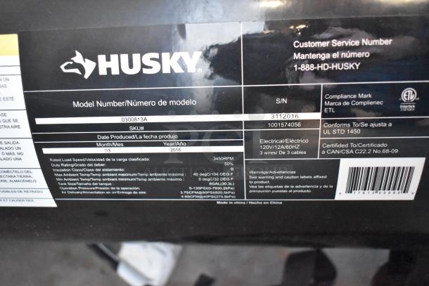 Husky 8 Gal. 150 PSI Portable Air Compressor, Model 0300813A; oil-free, rubber wheels, 120V/12A, ETL certified label shown.