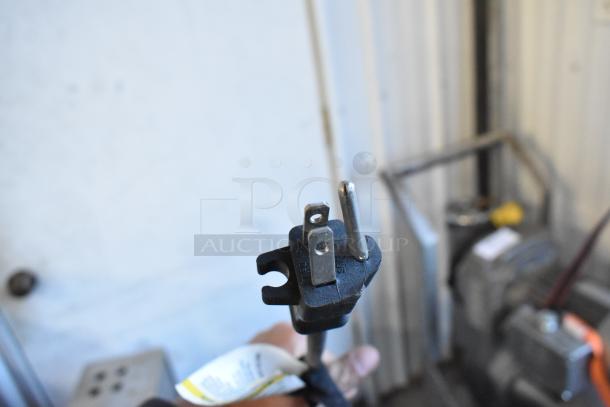 Husky 8 Gal. 150 PSI portable hotdog air compressor, model 0300813A, features rubber wheels and an oil-free pump.