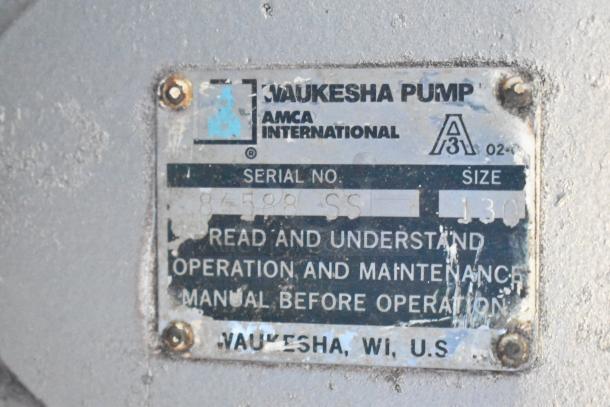 Waukesha Pump Metal Compressor, serial 84588 SS, size 130, AMCA International label, worn but legible.
