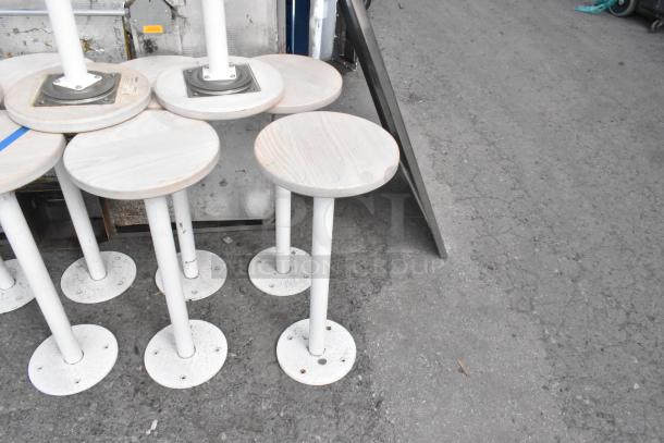 14 Staach Market Collection Boltdown Stools, white base, light wood seat, used. Boltdown mechanism visible.
