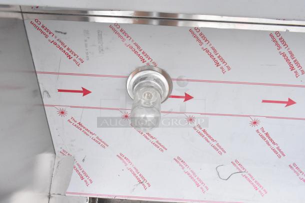 Brand new CaptiveAire 5424 ND-2 stainless steel grease hood, features filters and lights, minor cosmetic scratches.