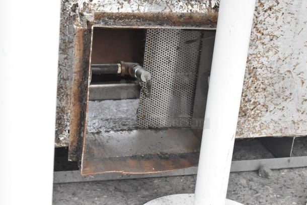 BRAND NEW SCRATCH AND DENT! 5' CaptiveAire 5424 ND-2 stainless steel grease hood with filters and lights, surface wear visible.