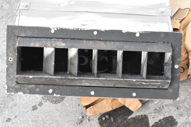 Metal duct with rectangular shape, visible rivets, and multiple louvered vents. Appears to be in good used condition.