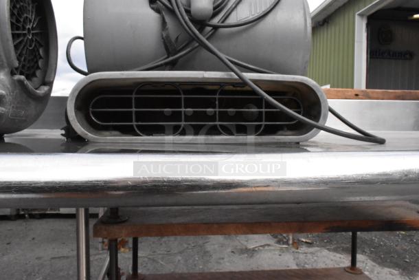 B Air VP-50 black poly air mover fan, 115 volts, 1 phase, shows used condition; features visible front grille and cords.