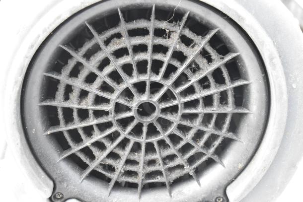 B Air VP-50 black poly air mover fan close-up, showing dust on the vent grill, 115 volts, 1 phase, auction lot of 2.