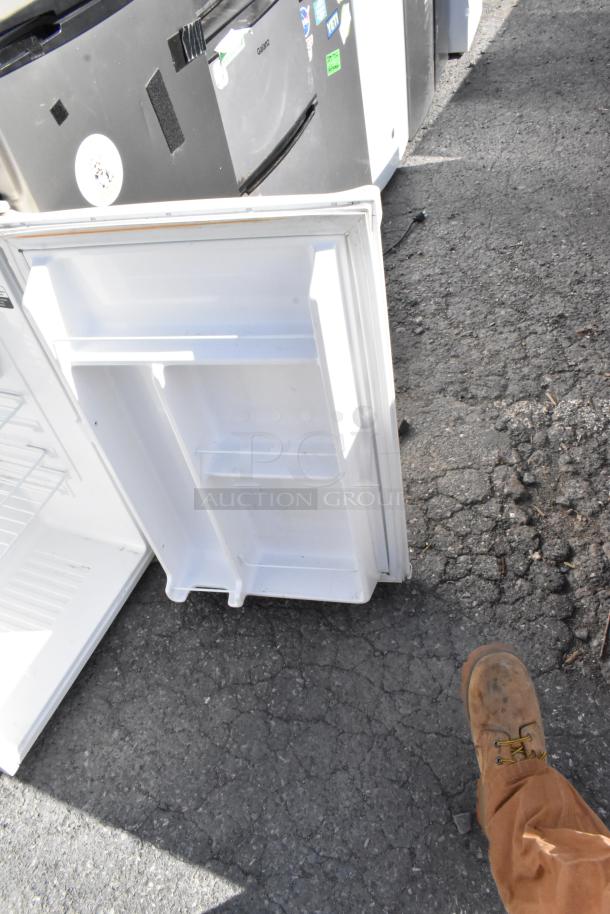 5 mini coolers including Frigidaire EFR331-BLACK-6COM, GE, Frigidaire EFR780-6COM, Galanz GLR31TS1E02, and Frigidaire FGFR334.