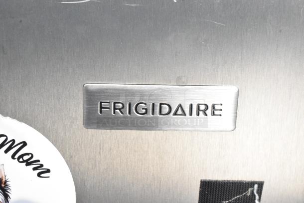 Frigidaire metal label on a mini cooler surface, indicating brand authenticity. Includes various coolers, 115 volts, 1 phase.