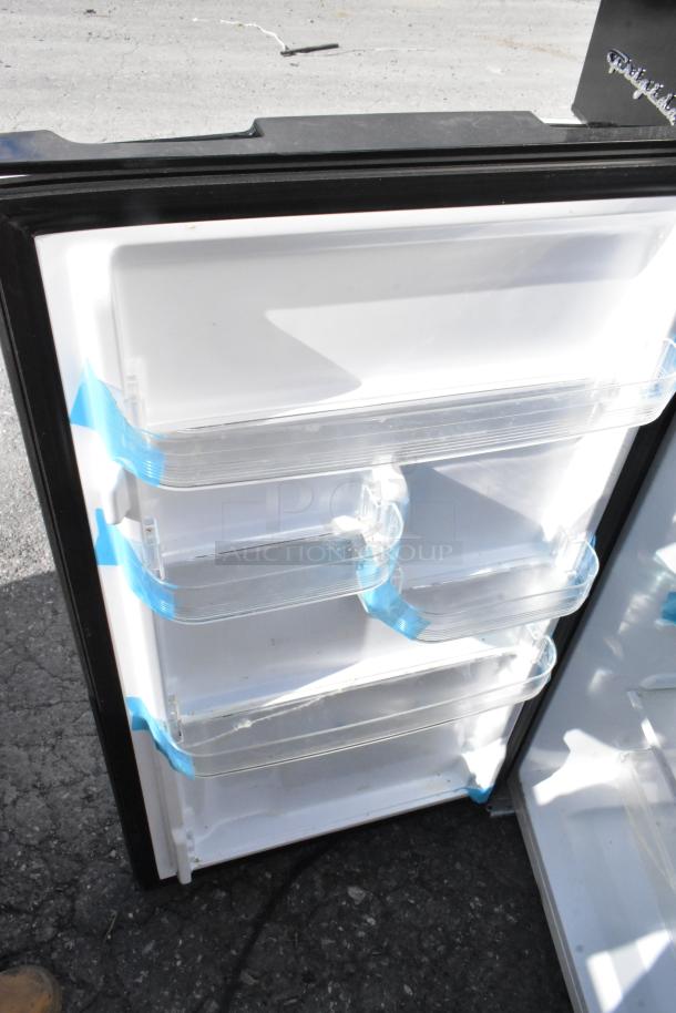 Mini cooler interior with clear shelves and blue edge protectors. Auction includes 5 coolers from Frigidaire, GE, Galanz.