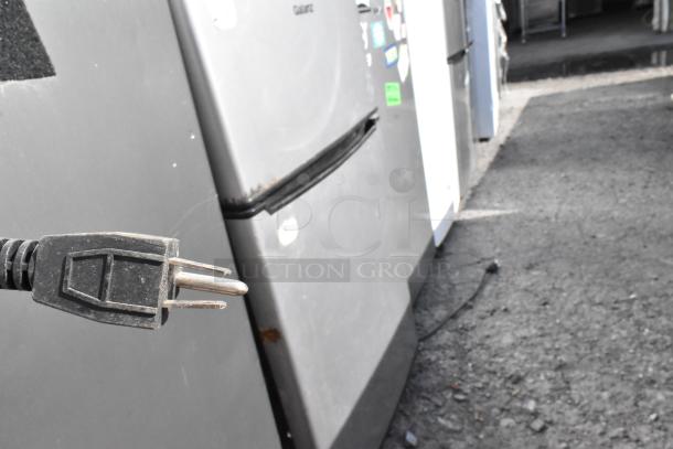 5 various mini coolers, including Frigidaire, GE, and Galanz models, 115 volts, 1 phase. Plug visible in foreground.