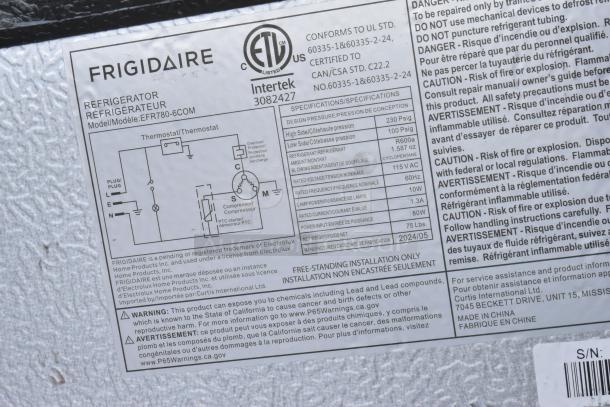 Label on Frigidaire EFR780-6COM mini cooler detailing specifications: 115V, 1 Ph, R600a refrigerant. Includes safety warnings.
