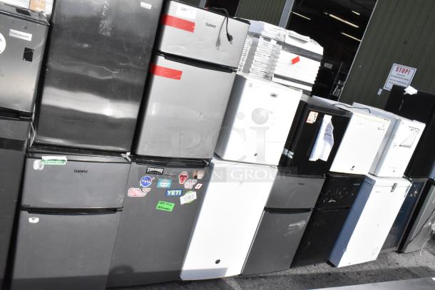 Six mini coolers, models including Galanz GL31S5, Whirlpool WH35S1E, Summit FS22L, GE GME04GGHWW, on display. 115 volts, 1 phase.