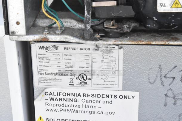 Mini cooler with a Whirlpool WH35S1E model label, 3 cu ft capacity, 120V, 60Hz. Includes California warning label.