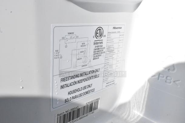 Label on mini cooler with installation instructions and specifications. Lists "Freestanding installation only" and "Household use only."