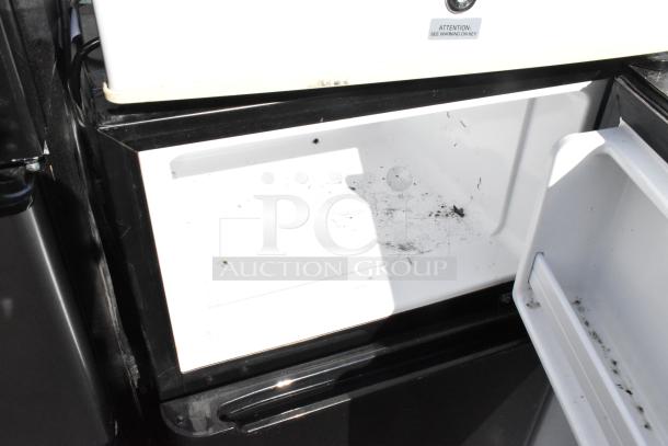 Four mini coolers including EdgeStar CMF151L, Black & Decker BCD33B, Summit FS22L, Hisense WFC050M6XWD, 115V, shown open.