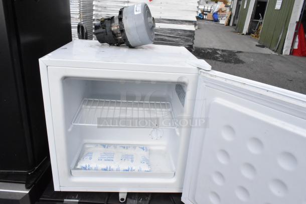 Four mini coolers, including Tramontina 80901/100, EdgeStar CMF151L-1, Galanz GL43S5, 115 volts, 1 phase, up for bid.