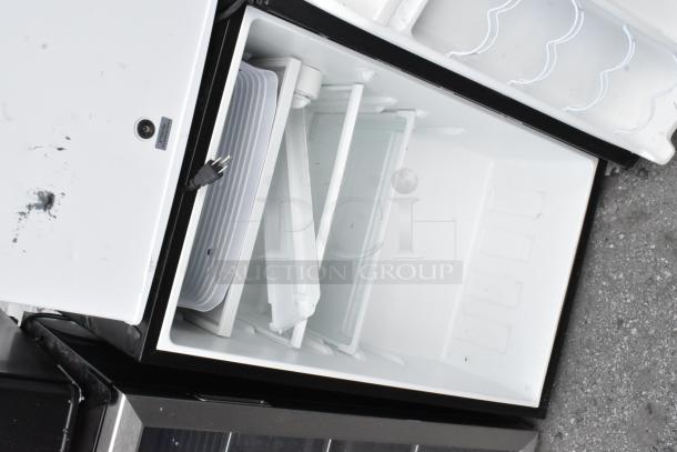 Four mini coolers including Tramontina 80901/100, EdgeStar CMF151L-1, Galanz GL43S5, shown open. 115 volts, 1 phase.