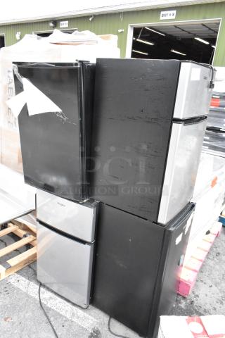 Four mini coolers, including Galanz GLR31TS1E02, Galanz GLR33MBKE23, GE WMR04BAPBB, Whirlpool WH31S1E. 115 volts, used.