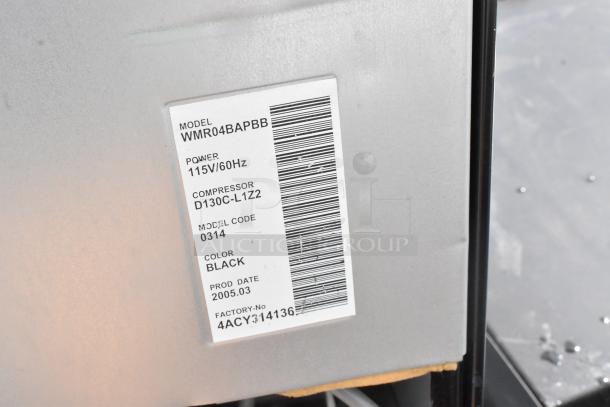 Label on mini cooler model GE WMR04BAPBB, 115V, 60Hz, Black, compressor model D130C-L1Z2, production date March 2005.