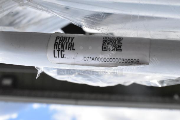 Label on folding chair, "Party Rental LTC," with a QR code and serial number 07*A000000000396906.