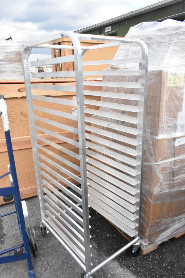 BRAND NEW Metro RT183N 18 Pan End Load Bun / Sheet Pan Rack with commercial casters, some scratches/dents visible.