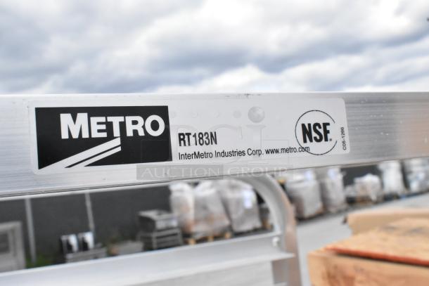 BRAND NEW Metro RT183N 18 Pan End Load Sheet Pan Rack with commercial casters, scratch and dent condition, NSF certified.