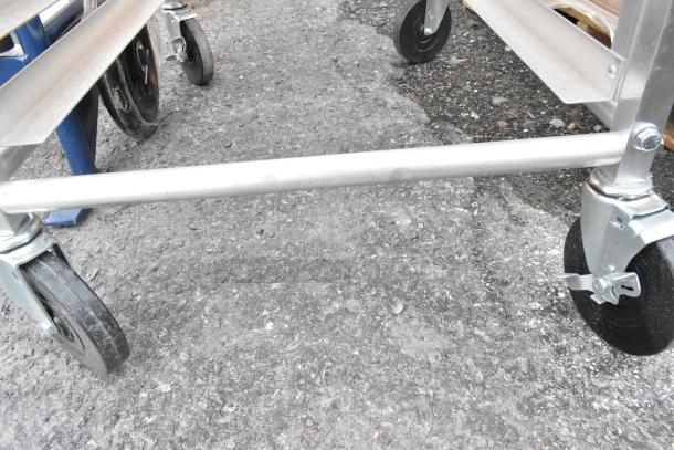 Brand new Metro RT183N 18 pan rack on commercial casters, minor scratches and dents, sturdy metal frame, lockable wheels.