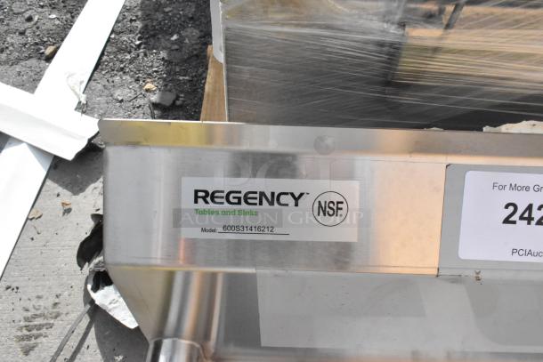 Regency stainless steel sink, model 600S31416212, new scratch and dent, with two drainboards, missing legs.