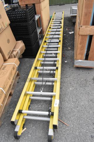 BRAND NEW Werner 40' Straight Ladder, yellow, scratch and dent condition, aluminum rungs, safety chains attached.