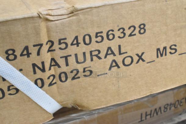 Cardboard box with black printed text showing shipping details and packaging tape.