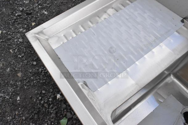 Regency 600B41014213 underbar sink, 4 bowls, 2 drainboards, 72"x18.75". New with scratches and dents. Stainless steel.