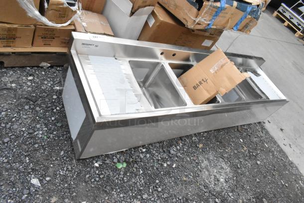 Brand new Regency 600B41014213 4-bowl underbar sink with two drainboards, 72"x18.75", scratch and dent condition.