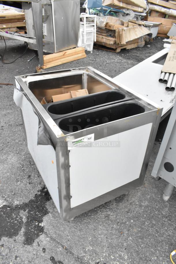 BRAND NEW SCRATCH AND DENT Regency 24" x 18" stainless steel portable ice bin, with visible Regency and NSF labels.
