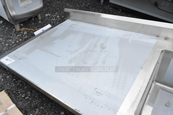 Brand new Regency 600ST3060R stainless steel table with sink basin, under shelf; scratch and dent condition.