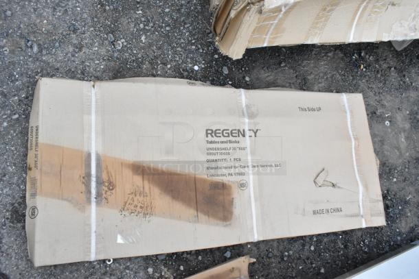 Regency 600ST3060R table with sink and undershelf, new with scratches and dents, in original packaging, marked NSF, made in China.
