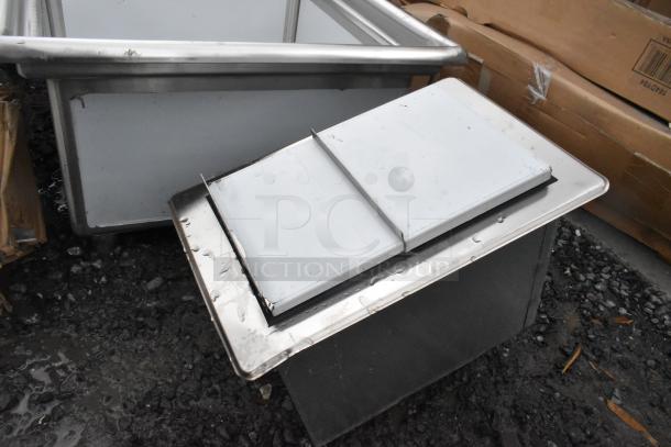Advance Tabco D-12-IBL stainless steel drop-in ice bin, 12" x 18", new with scratches and dents visible.