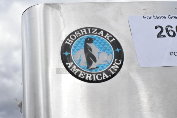 Hoshizaki DCM-500BAH stainless steel ice maker, dispenser on SD-500 cabinet. Features Hoshizaki logo and 115-120V marking.