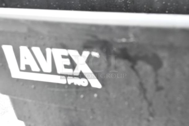 Brand New Lavex Pro 23 Gallon Black Slim Trash Can, Scratch and Dent. Bold Lavex logo visible. Auction includes four cans.