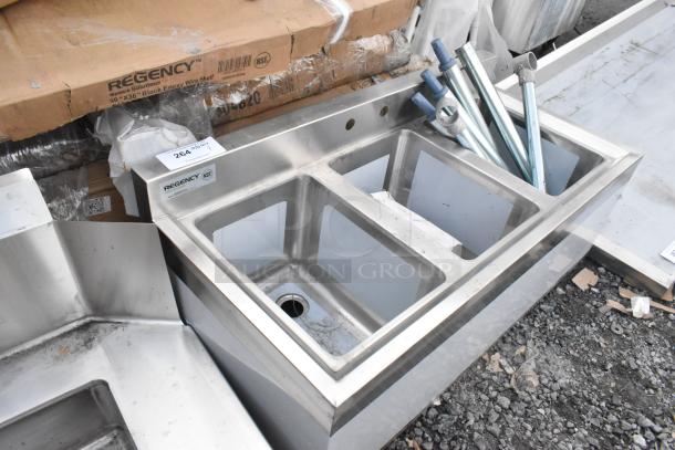 Brand new Regency 600B31014 3-bowl underbar sink, 38.5"x18.75", stainless steel, minor scratches, NSF certification visible.