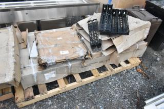 Pallet with boxed 600TSB3072S stainless steel work table, Regency 460EB3036 wire shelf, Lancaster TB3030 base, in scratch and dent condition.